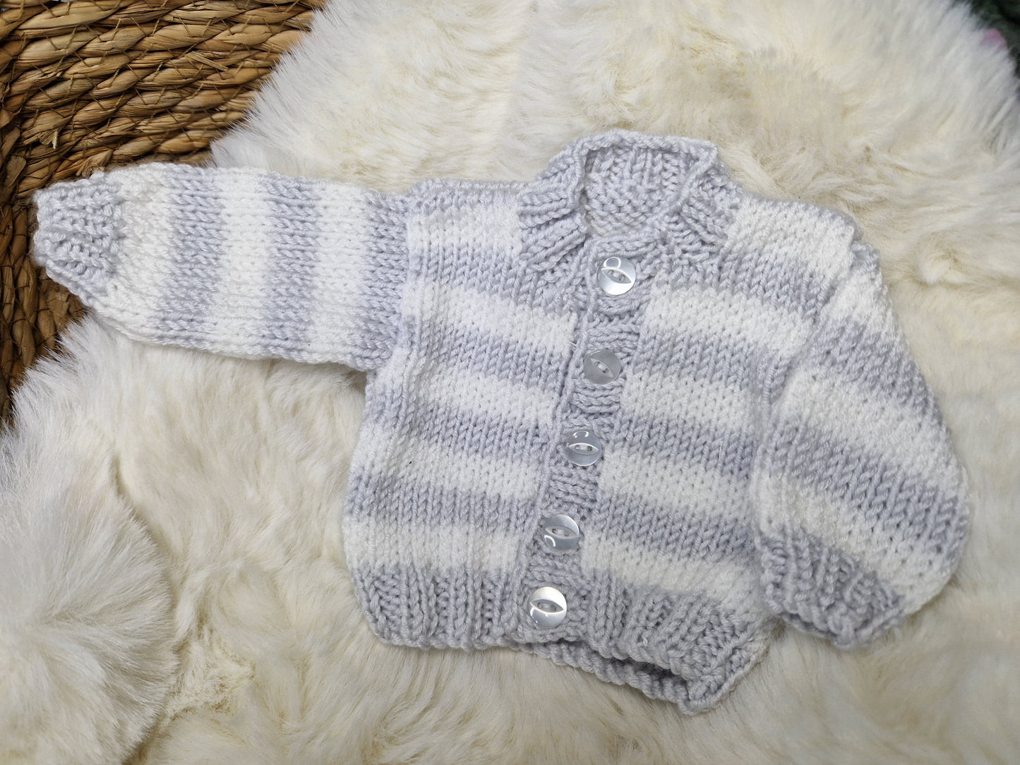 Handknitted 12-13inch cardigan.